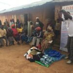 Stop Over Distribution of Clothes_Sanitary Pads_and mosquito nets to refugees in Ndumyaji 1 village
